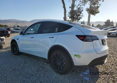 2023 Tesla Model Y from USA, damaged, VIN 7SAYGDEE2PF746748